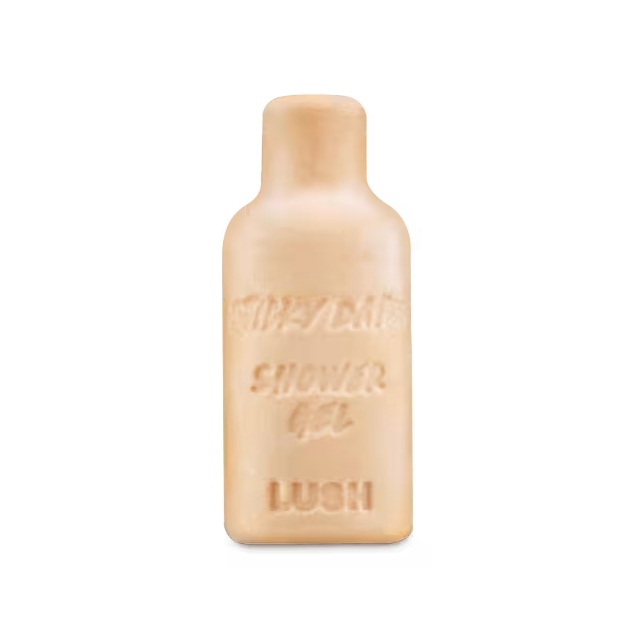 Béžový tuhý sprchový gel Sticky Dates od Lush ve tvaru lahvičky